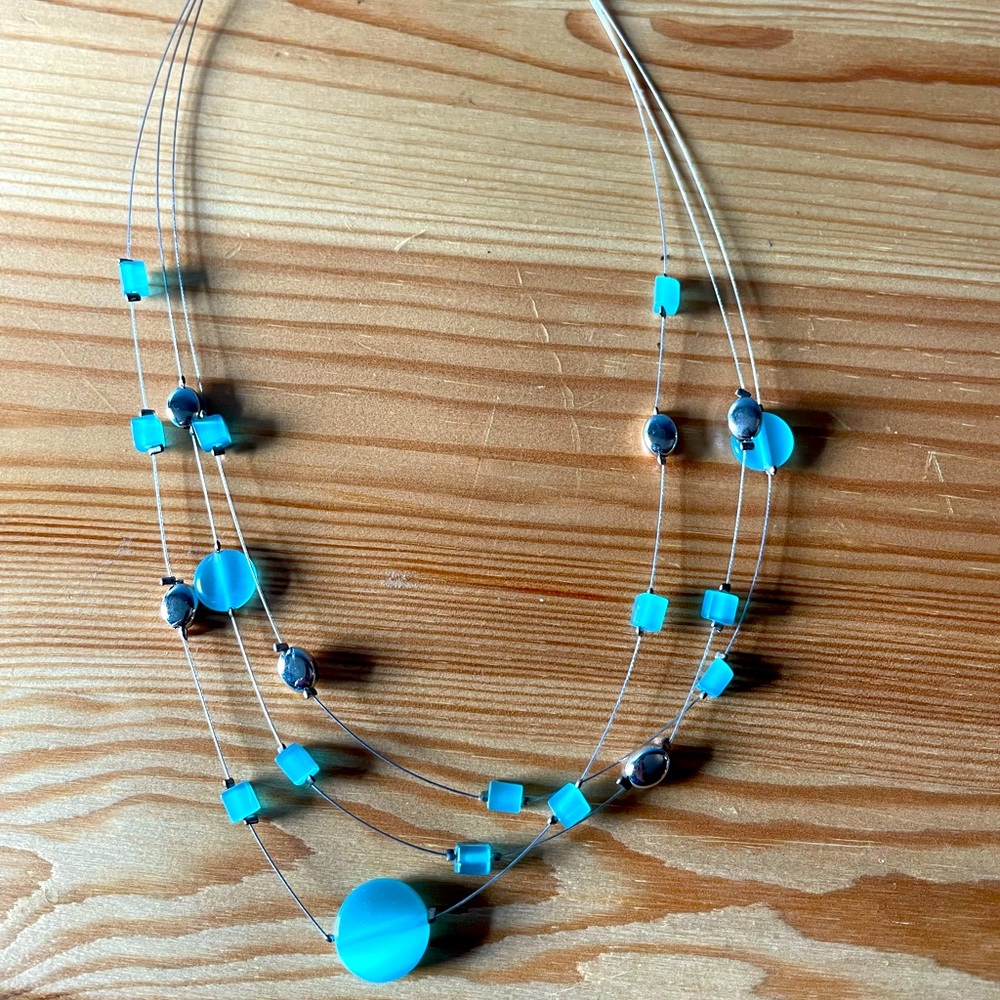 Aquamarine And silver Lia Sophia necklace.